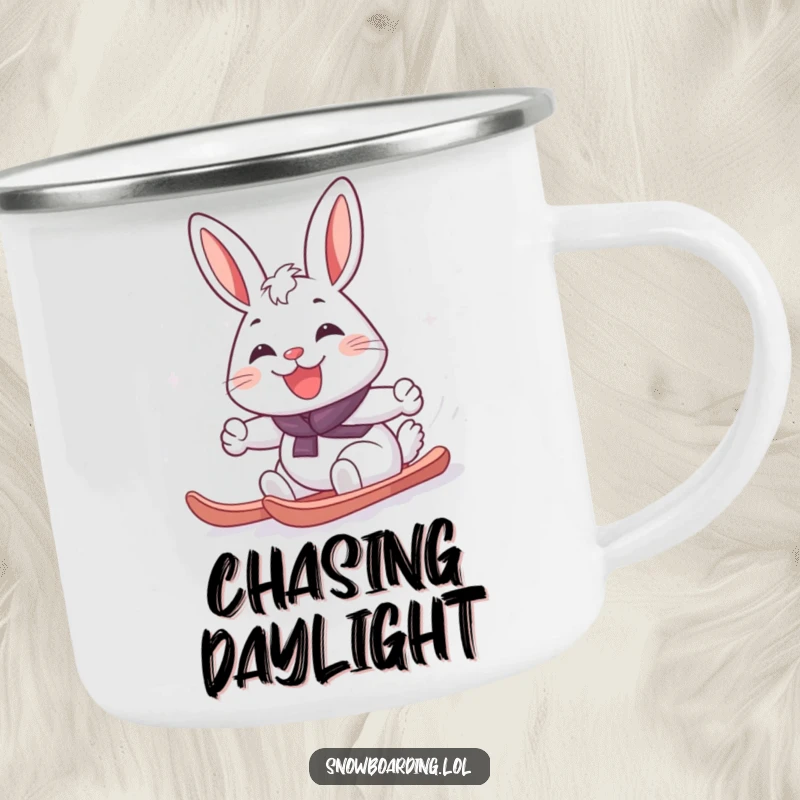 Funny cheerful rabbit carving a snowboard turn with a big grin, on a durable camping mug for humorous outdoor enjoyment.