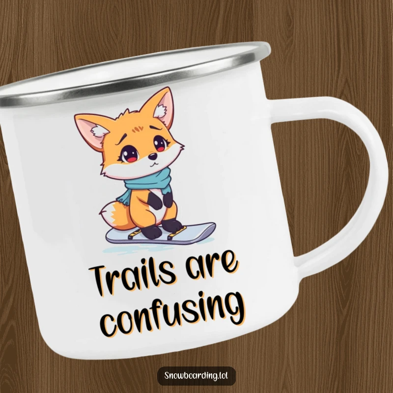 Funny camping mug with a confused fox trying to snowboard, ideal for outdoor amusement.