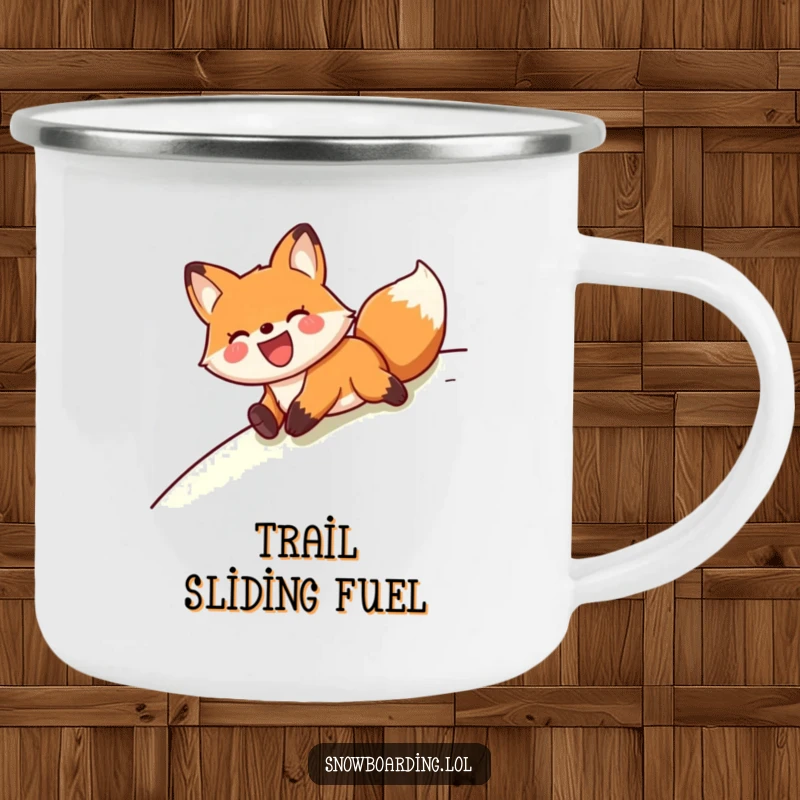 Funny fox enjoying a belly slide down a slope, depicted on a durable enamel camping mug.