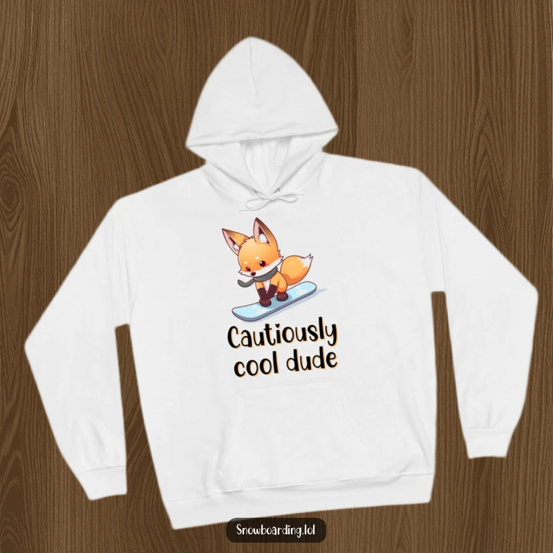 Funny curious fox cautiously testing its snowboard, a warm and humorous hoodie for winter contemplation.