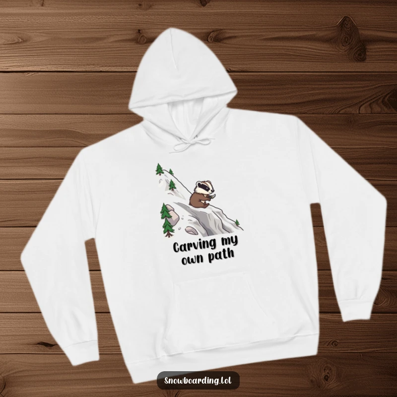 Funny hoodie with a brave badger confidently snowboarding down a mountain, carving smooth, impressive turns.
