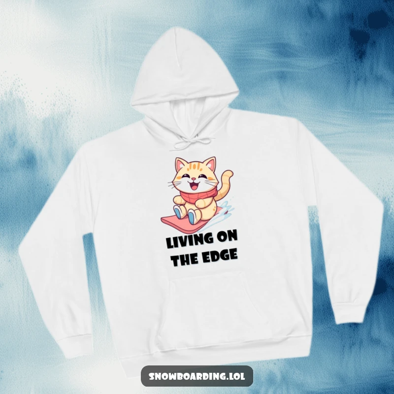 Funny grinning cat sliding on a snowboard with windblown fur, featured on a hoodie.
