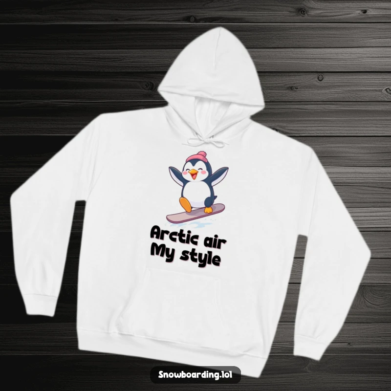 Funny Penguin Snowboard Hoodie: A penguin attempting a snowboard jump with flailing arms brings cozy, funny vibes.