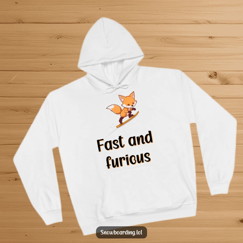 Funny skiing fox hoodie, showing a determined fox gracefully gliding down a snowy mountain, bringing winter humor.
