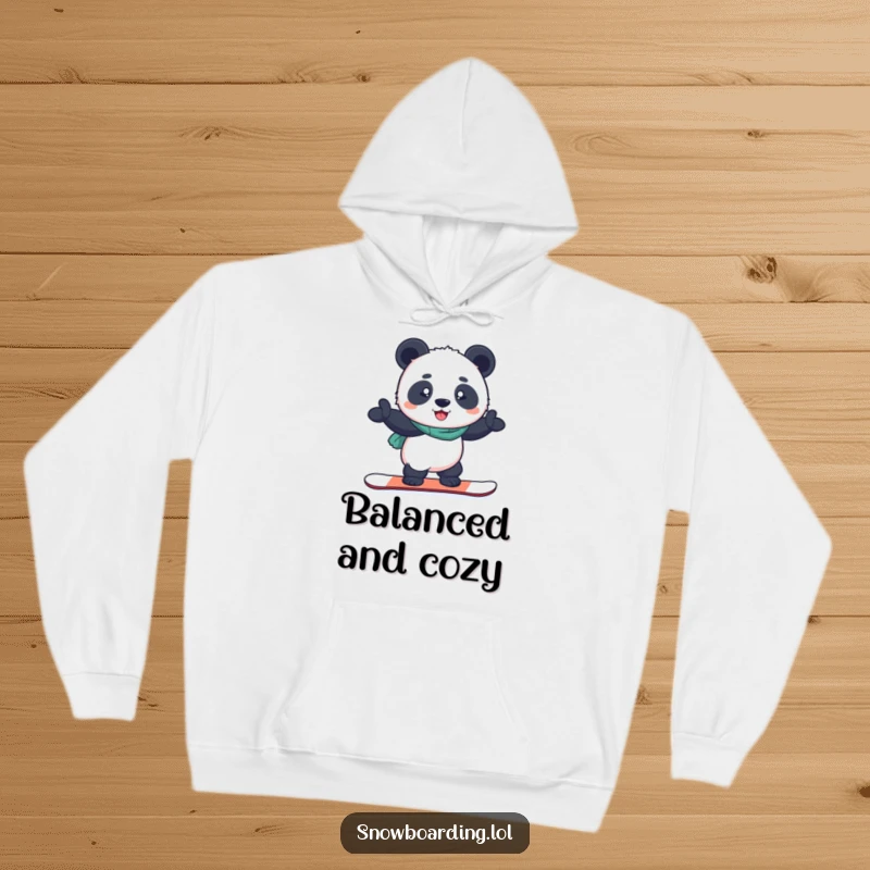 Funny hoodie depicting a determined panda balancing perfectly on a snowboard with a proud grin, radiating winter confidence.