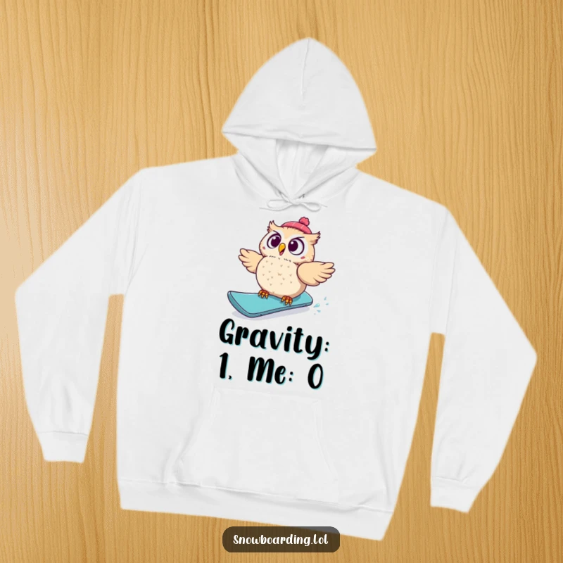 Funny hoodie depicting a startled owl tumbling from a snowboard, looking utterly surprised, a humorous and warm clothing item for winter.
