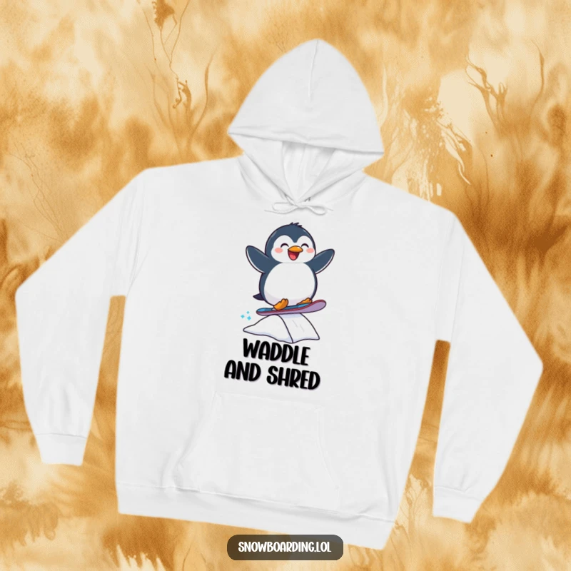 Funny hoodie featuring a joyful penguin snowboarding off a ramp, offering warmth and cool, humorous winter design.