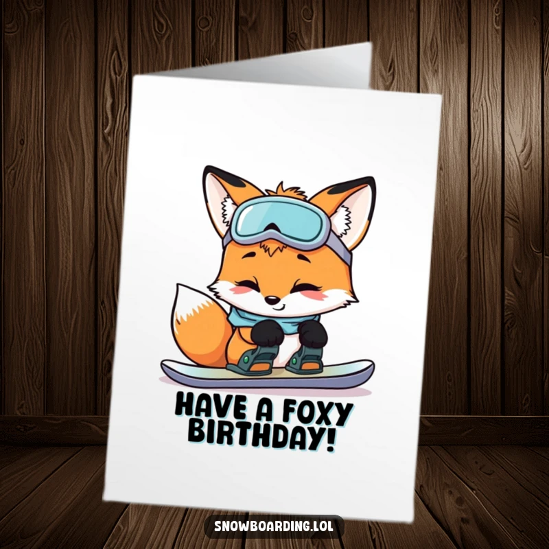 Funny Free Printable Birthday Card: Curious fox smiling while inspecting snowboard bindings. Clever downloadable gift.