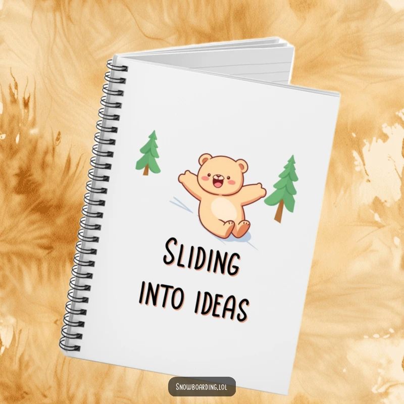 Funny bear notebook, happily sliding down a snowy slope with arms outstretched, perfect for jotting down winter adventures.