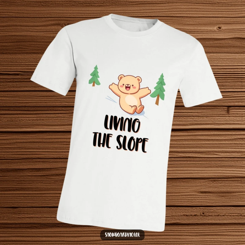 Funny bear t-shirt, happily sliding down a snowy slope with arms wide open, celebrating winter adventure and freedom.