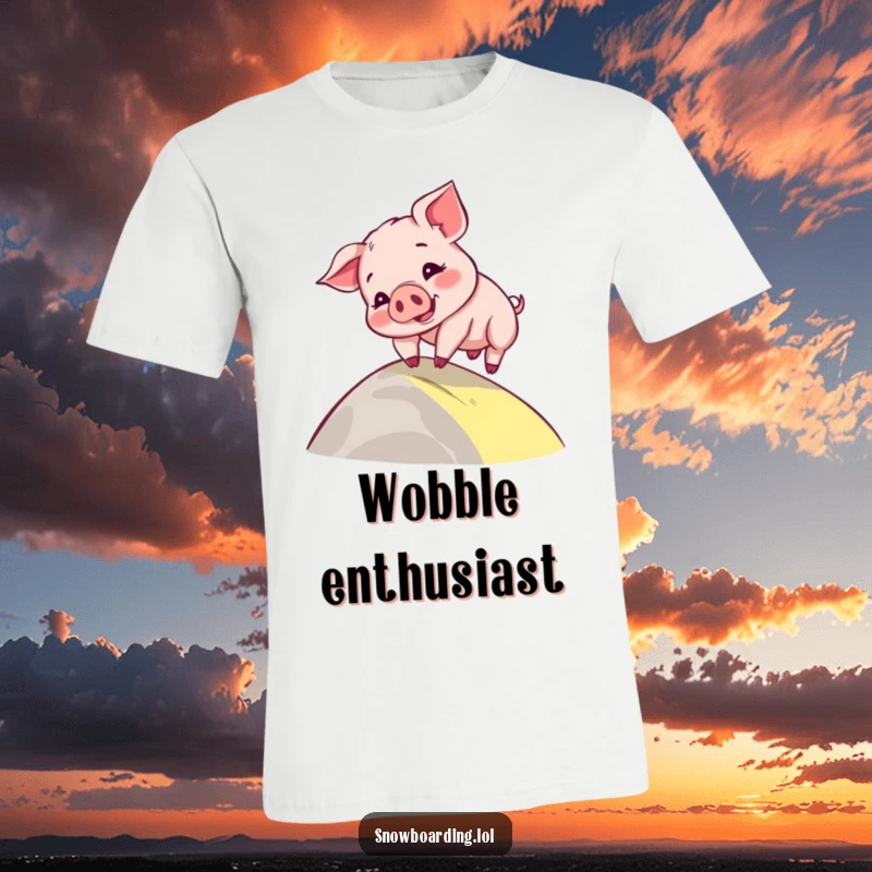 Funny t-shirt featuring a playful piglet comically wobbling down a slope, a cartoon character embodying adorable clumsiness.