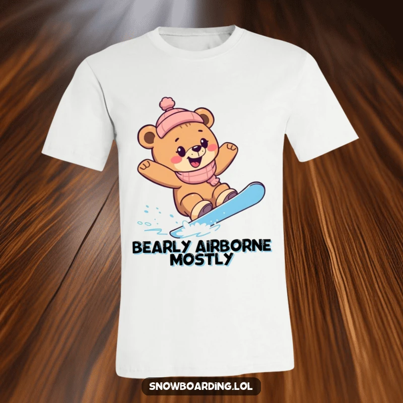 Funny Snowboard Bear Cub T-Shirt: A happy bear cub joyfully snowboardings, carving sharp turns with pure delight.