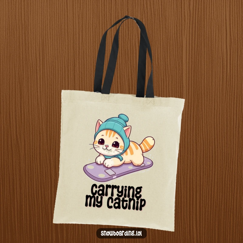 Funny tote bag with a curious cat sliding on its belly down a snowy slope on a snowboard, ready to carry your items humorously.