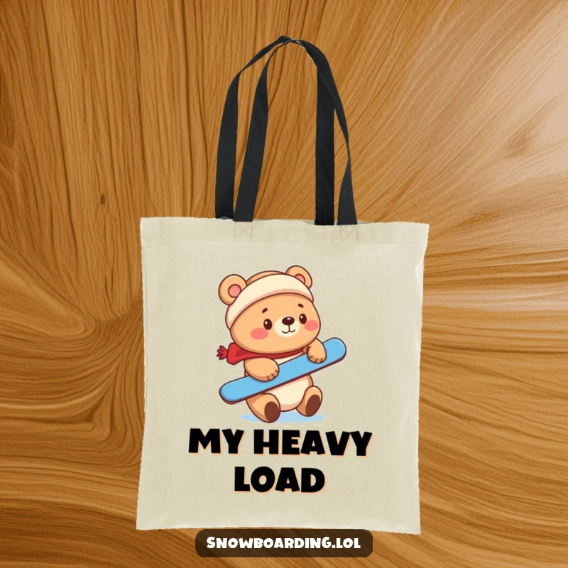 Funny cute bear balancing a snowboard on its nose on a tote bag.